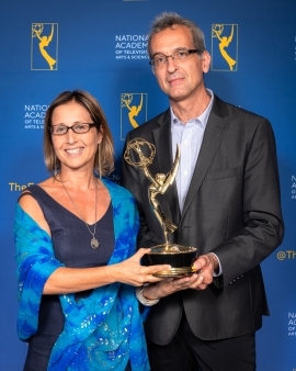 Lorena Luciano and Filippo Piscopo holding an Emmy they won in 2019