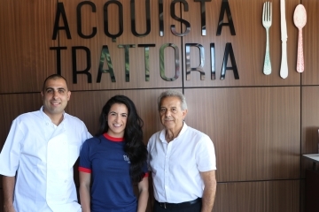 Acquista Trattoria owners and Kristen Greto posing for photo