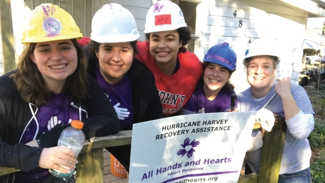 St. John’s students enjoy a break while working on a home for All Hands and Hearts–Smart Response 1600x900