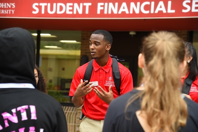 Orientation leader speaks to new students