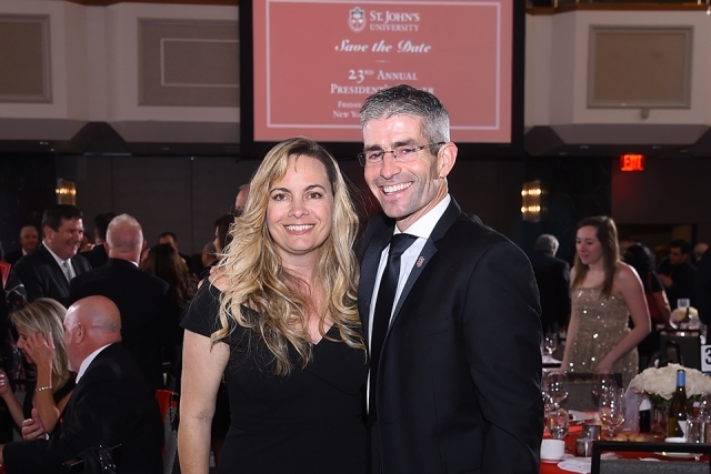 Two guests pose for a photo at the St. John’s University 2019 President’s Dinner 