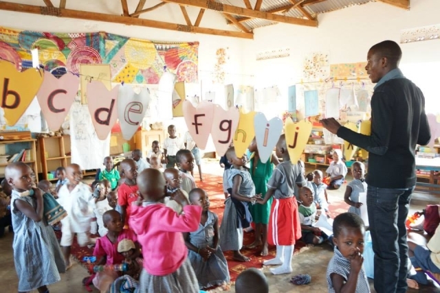 Children in Uganda learning in a classroom