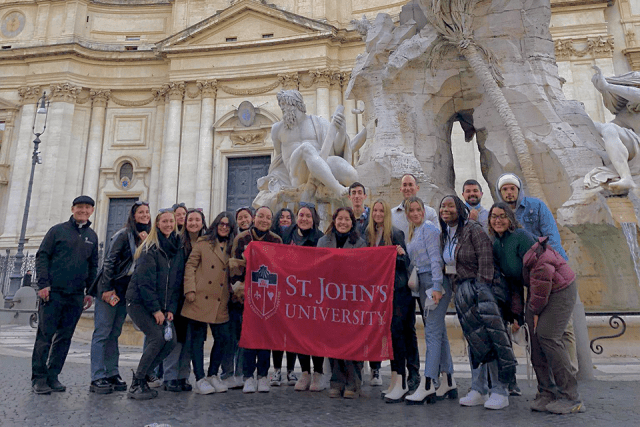 Johnnies pose for a picture in Rome
