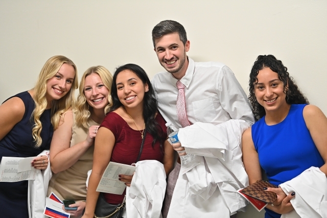 Physician Assistant students pose for a group photo at the white coat ceremony
