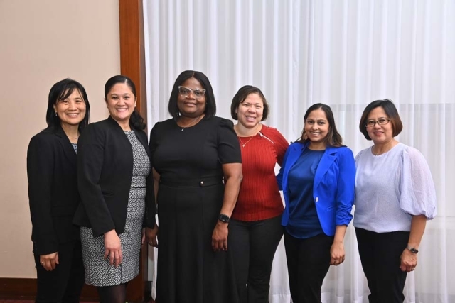 St. John's female employees pose for a photo at VMC Cohort 13 Graduation