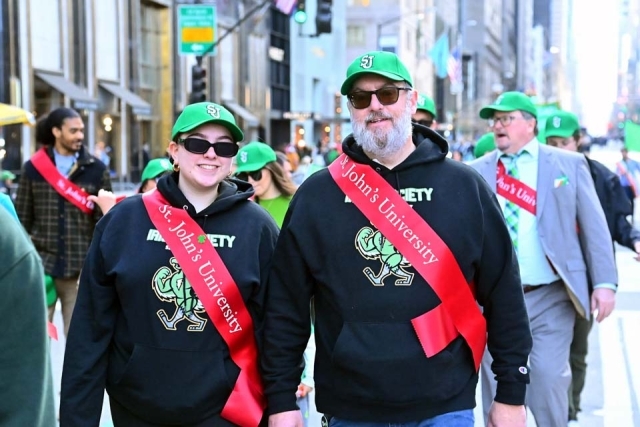 St. John's Alumnus walking in St. Patrick's Day Parade in NYC 