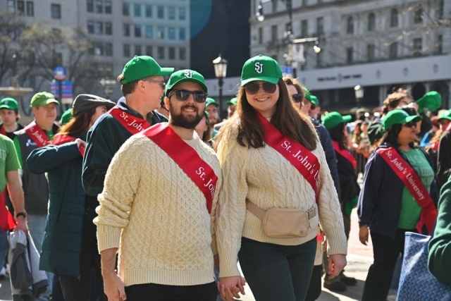 St. John's Alumnus walking in St. Patrick's Day Parade in NYC 