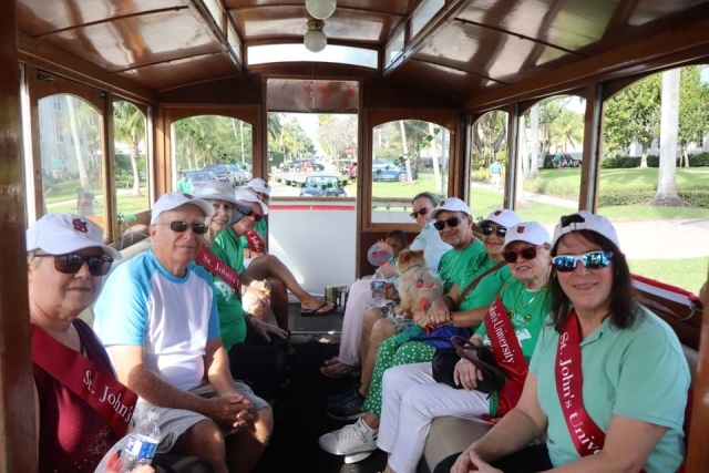 St. John's Alumni on trolly at St. Patrick's Day Parade in Florida