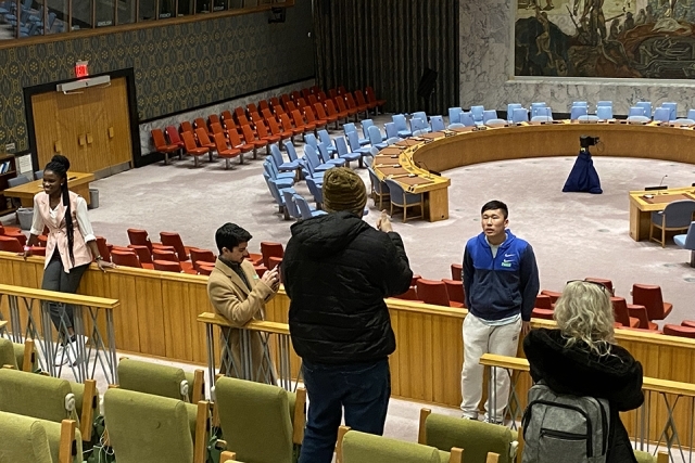 students taking a photo of inside the UN facility