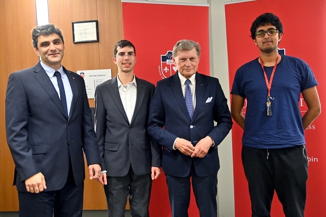  Leszek Balcerowicz, Ph.D. ’74CBA with St. John's students and staff
