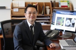 Wan Seok Yang at his computer