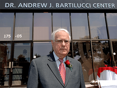 Andrew Bartilucci in front of the Dr. Andrew J. Bartilucci Center