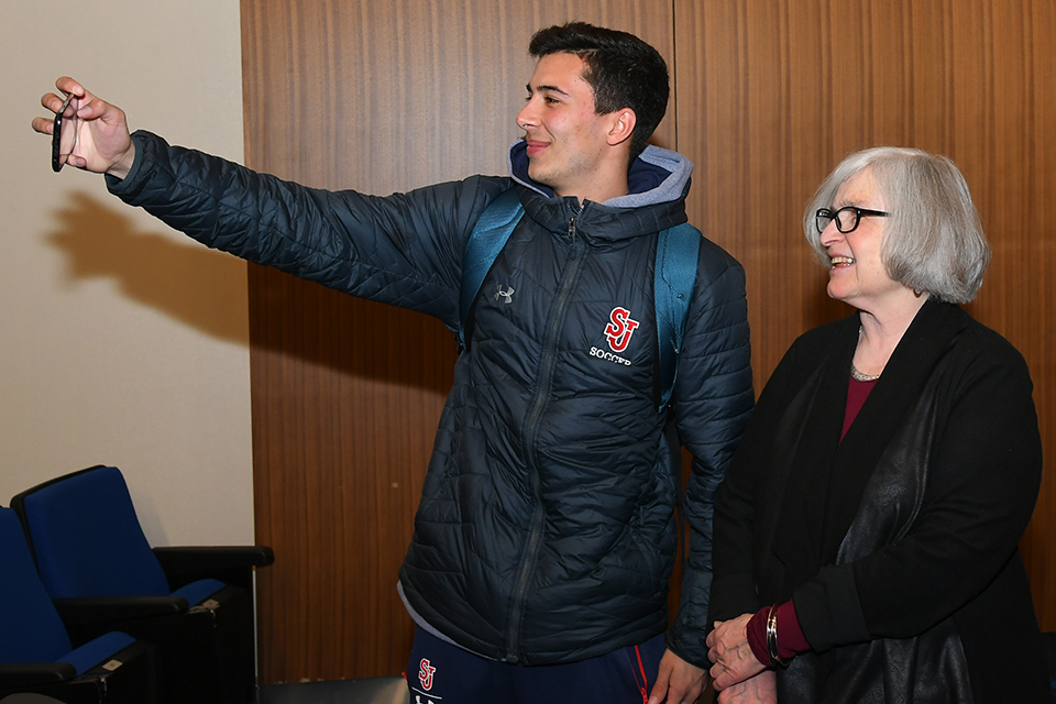 Hasia R. Diner, Ph.D. taking a selfie with a student