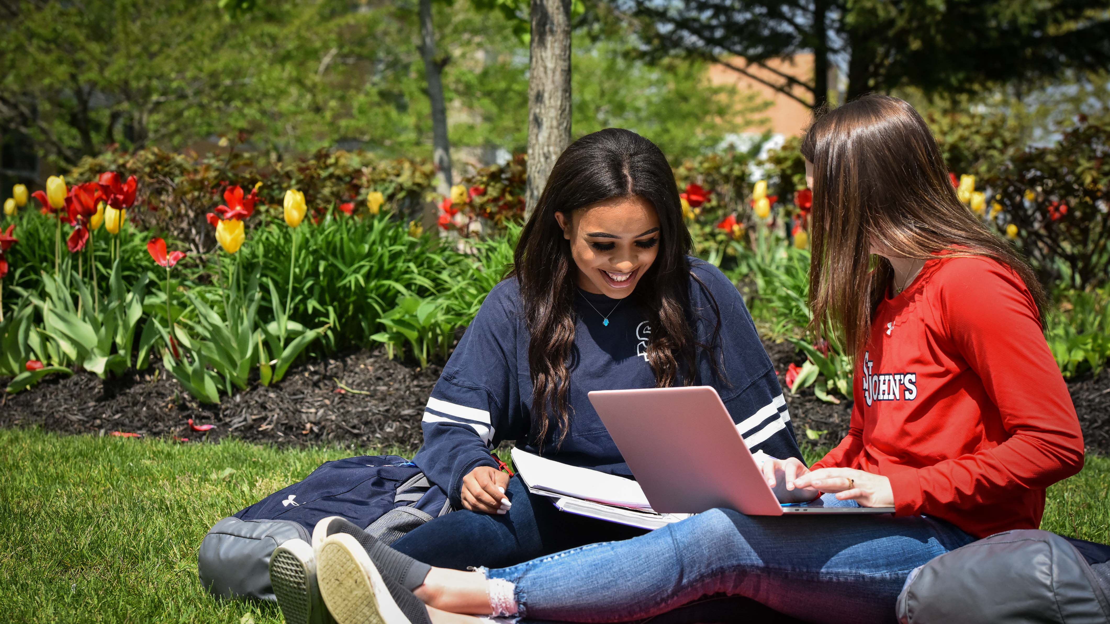 Two female students working on computer
