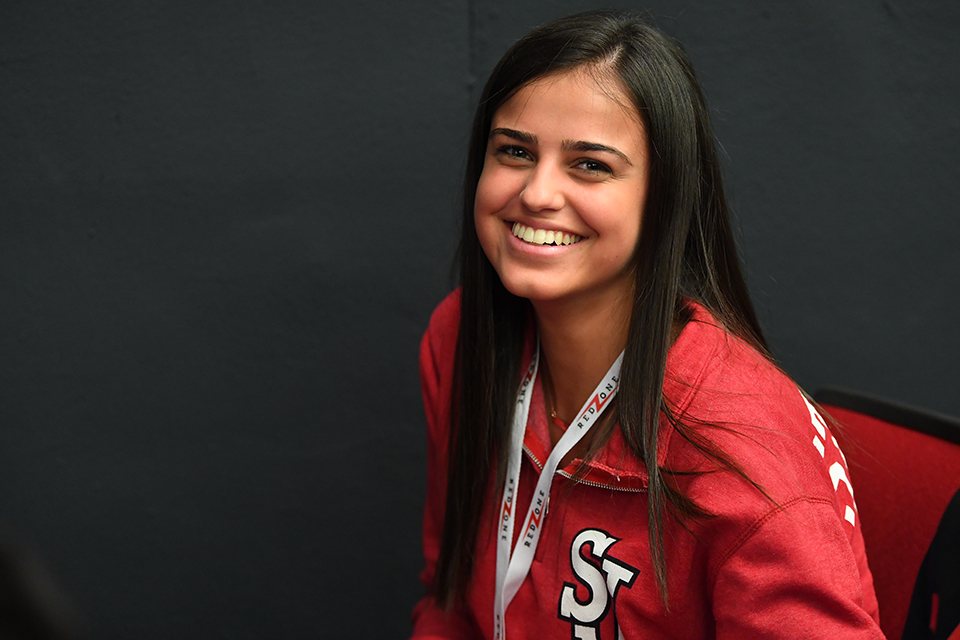 New student smiles for picture