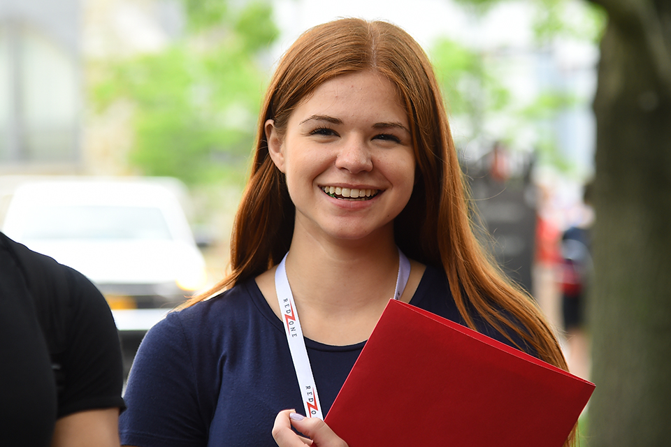 New student smiles for picture