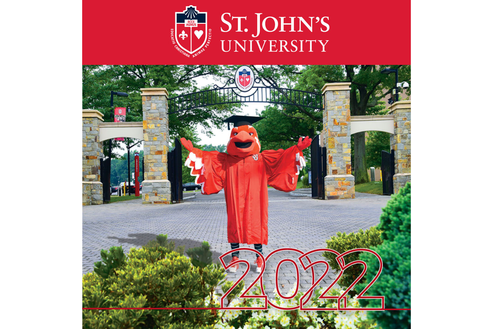 St. John's University Class of 2022 with Johnny Thunderbird posing for commencement photo in cap and gown.
