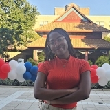 Arianna Bowen in front of Sun Yat Sen Hall