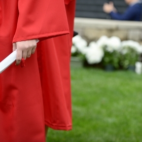 Graduate holding scroll