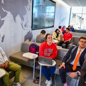 Faculty member talking to students