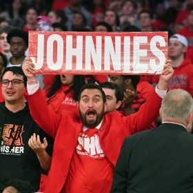 St. John's Universtiy Red Sports Fans Cheering in a crowd 
