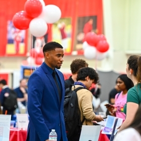 Student exploring his career interests at a job fair