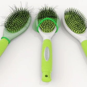 Three green hairbrushes with eznet product 