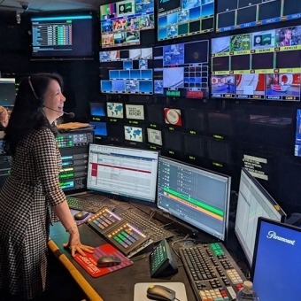 Women look at computer monitors 