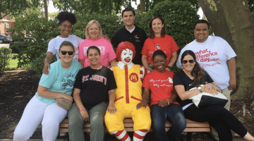 People on a bench at Ronald McDonald House