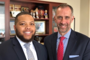 Terrell Hutchins (L) and Dean Michael A. Simons (R)