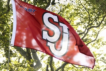 Flat with the St. John's University logo
