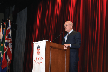 Daniel S. Glaser standing at the podium