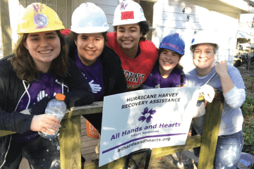 St. John’s students enjoy a break while working on a home for All Hands and Hearts–Smart Response