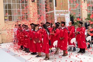 Rome graduates and confetti in the air