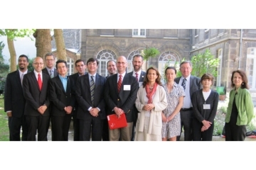 Group of faculty posing for photo outside