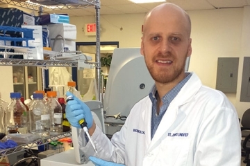 Lucas Montero ’15GP with pharmacy materials