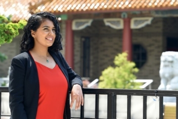 Hira Shafeeq ’09Pharm.D. in front of Sun Yat Sen Hall