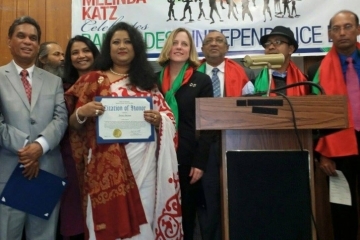 Sharmin receiving the Citation of Honor from Queens Borough President Melinda Katz in 2015