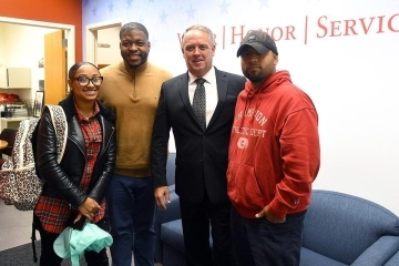 St. John's Veterans standing in front of Veterans Success Center
