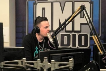 Michael McGinn ‘13CPS at radio mic