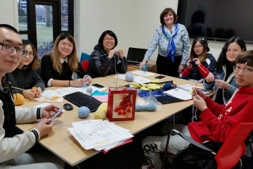 Donna Reale (fifth from left) with Knitters