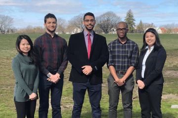 IPhO winners standing outside for a group picture