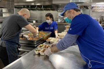 Teams preparing food for healthcare donations