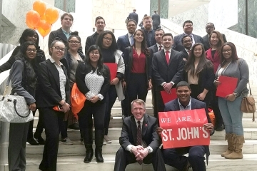 Johnny Wiley and Brian Browne with fellow students on steps