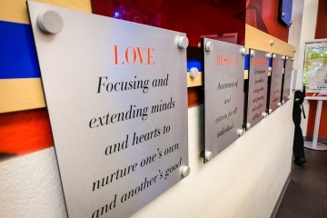 St. John's Core Values displayed on wall