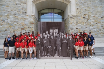 Johnnies from then and now in front of D'Angelo Center 