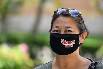 Woman is "St. John's mom" mask