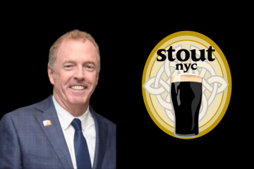 Martin Whelan with the Stout Logo