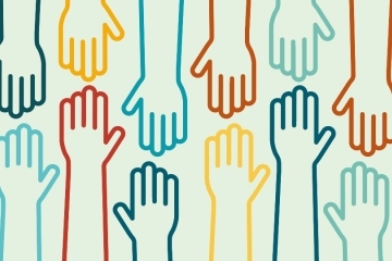 multi-colored arms and hands reaching towards one another