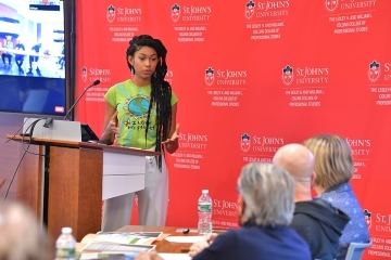 Student at podium during Pitch Johnny Competition